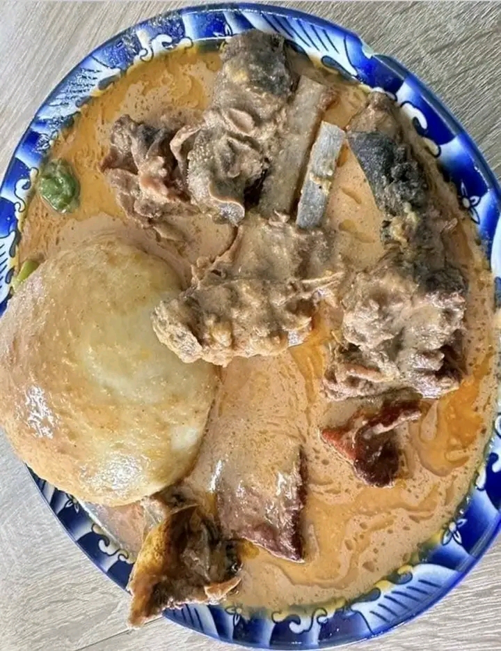 Fufu with Groundnut Soup, Chicken & Goat Meat