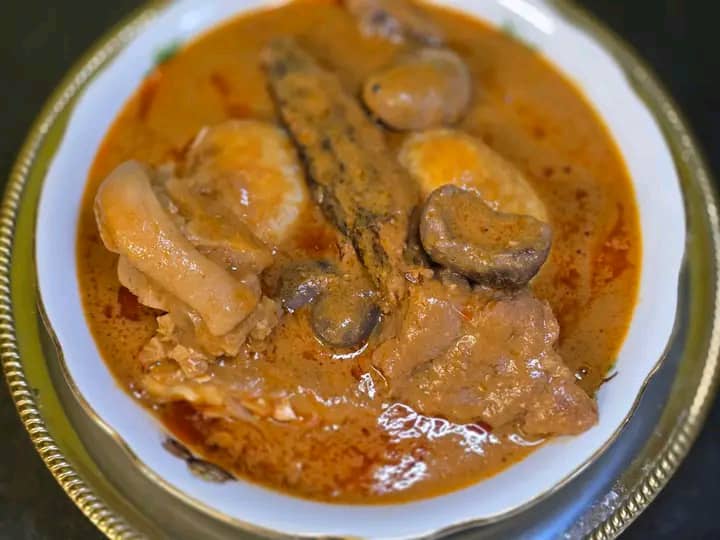 Banku with Palm Nut Soup & Goat Meat